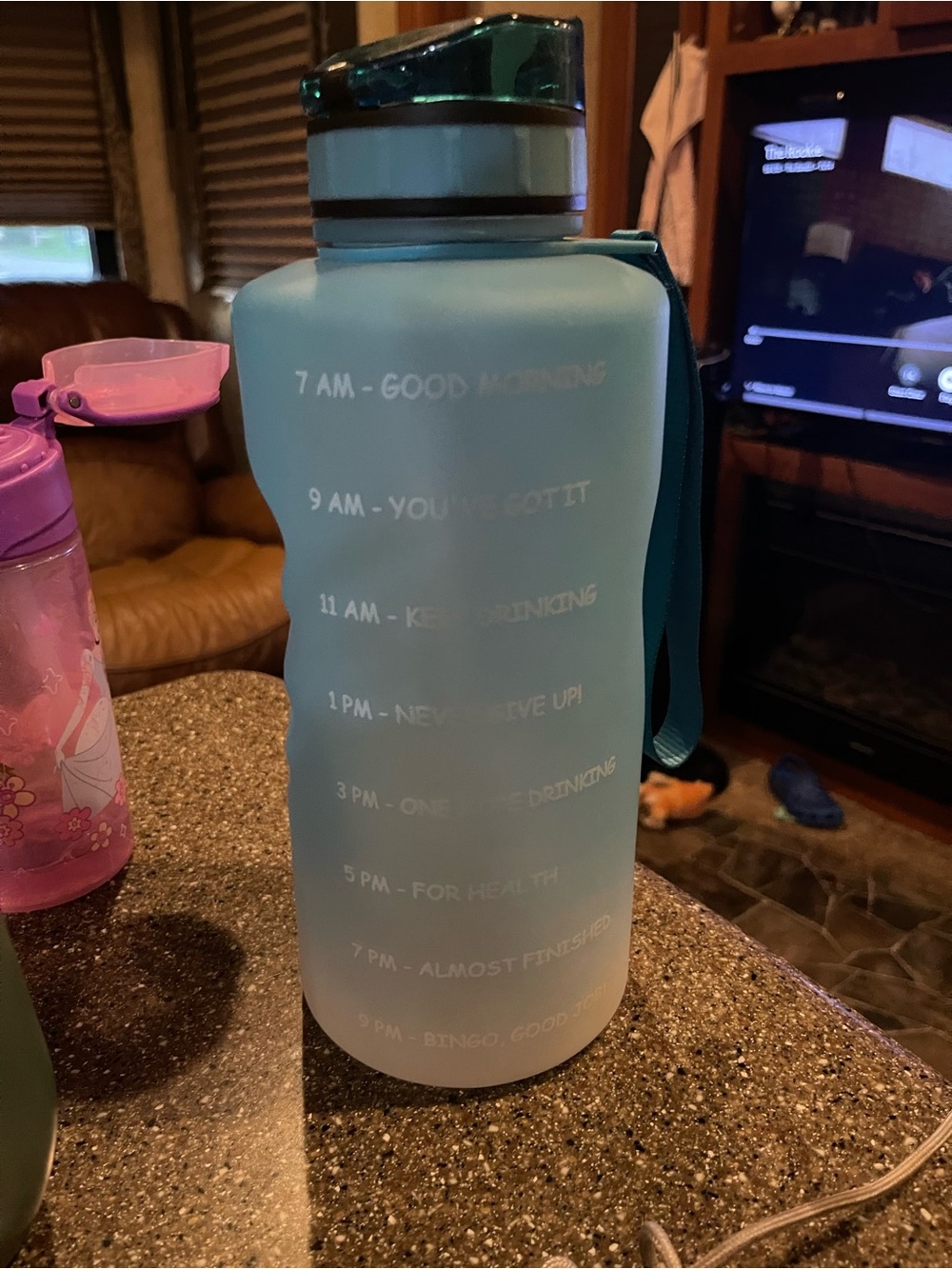 Amazon Light Blue Motivational Water Bottle with Teal Cap and Strap